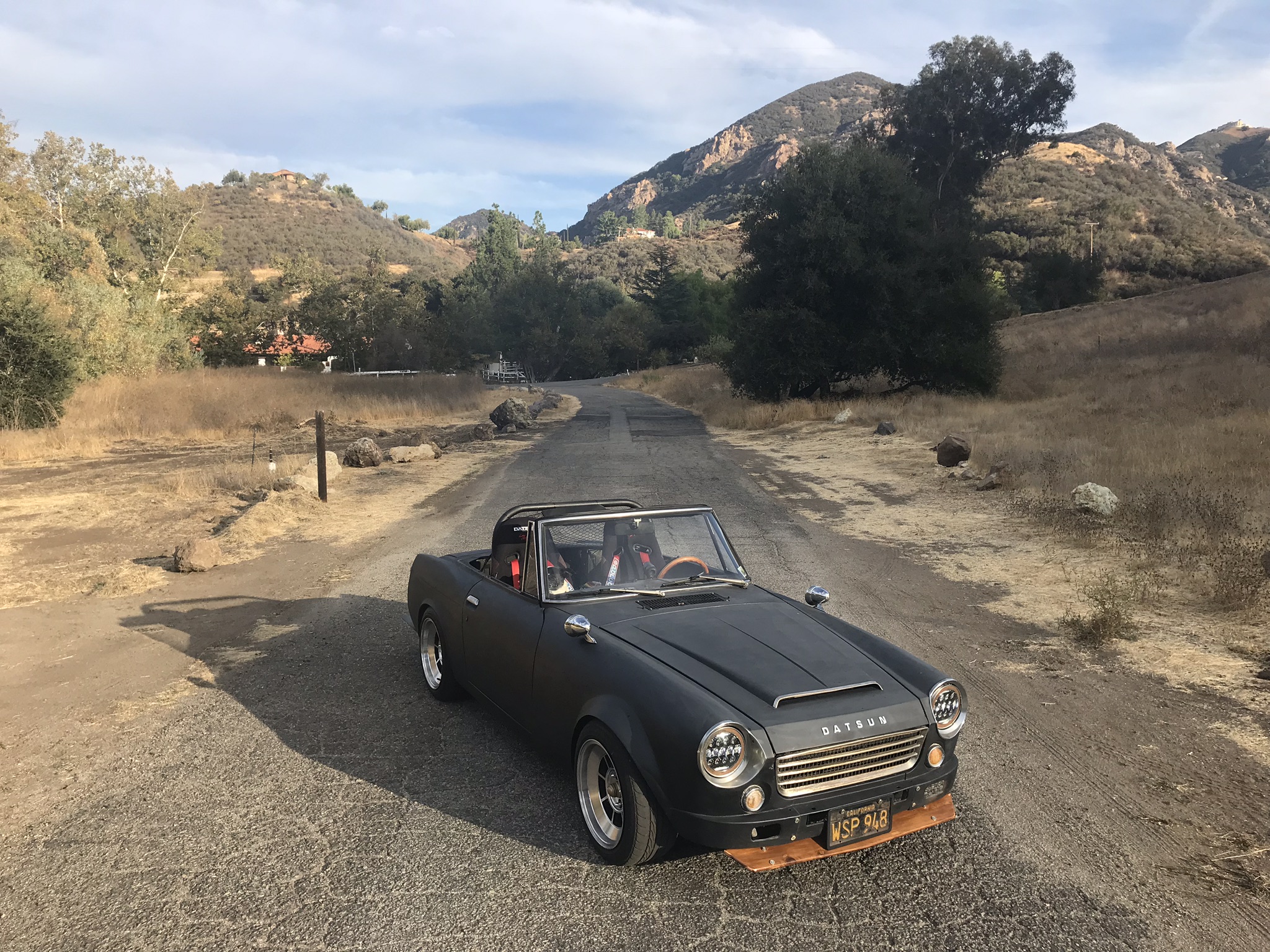 1968 Datsun Roadster in matte black